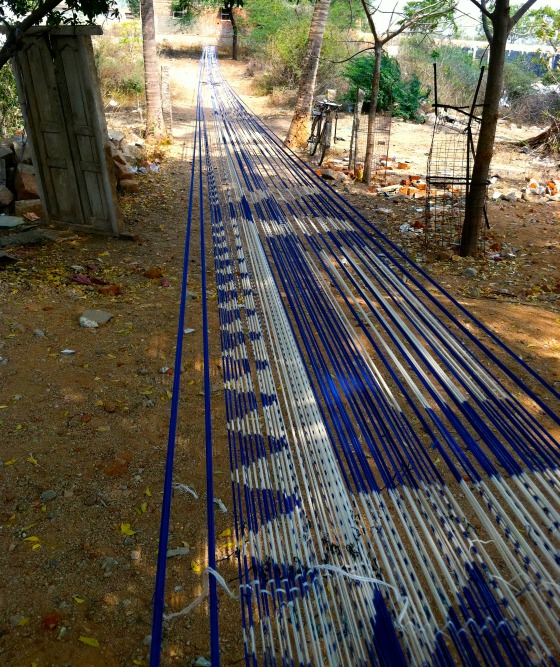 Weavers outside Hyderabad, India making impossibly long cloth.